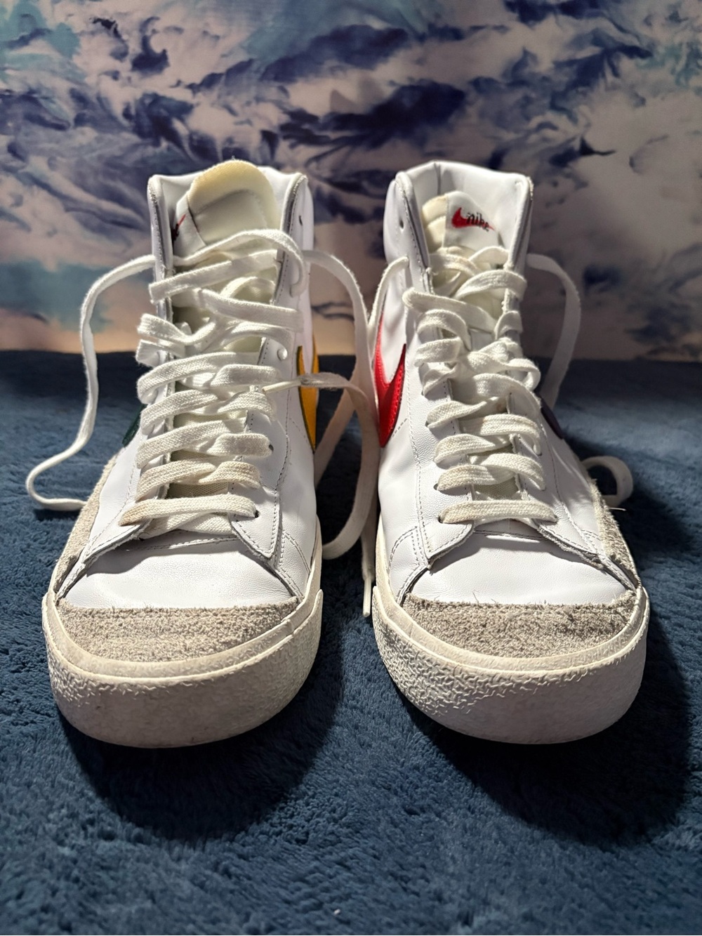 Nike Blazer mid ‘77 vintage high tops with mismatched basketball Swooshes